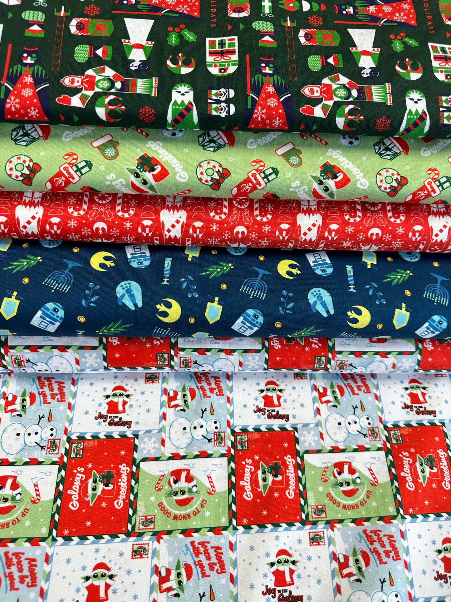Licensed Character Winter Holiday IV Winter Holiday Force Toss Green 73011380-03 Cotton Woven Fabric
