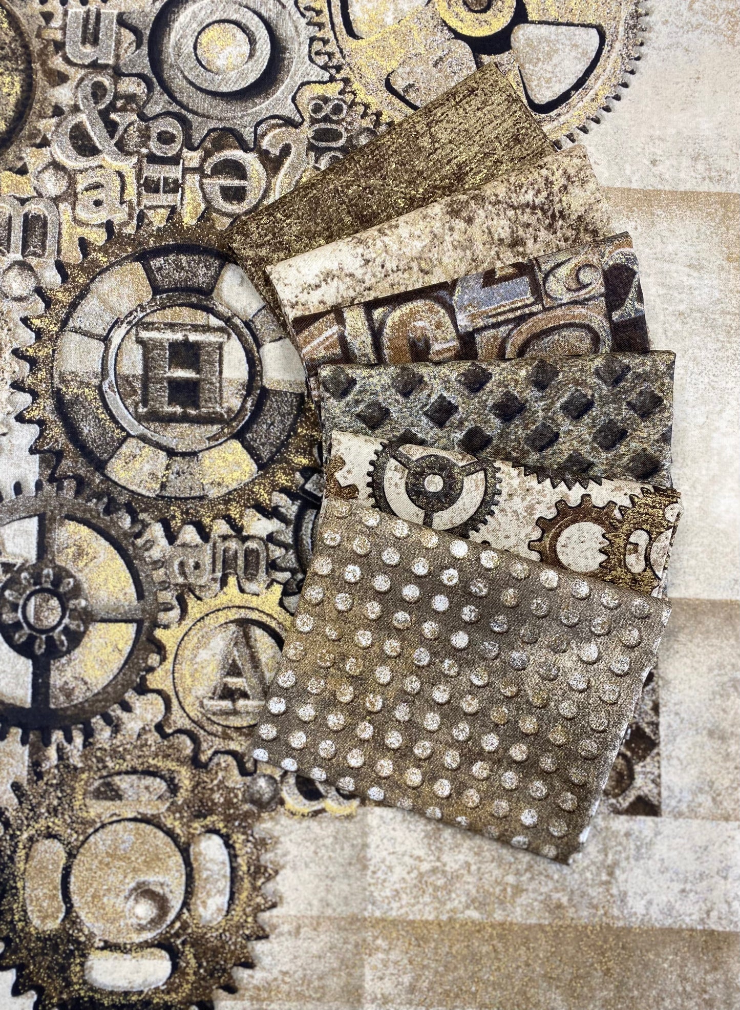 Heavy Metal Stonehenge by Linda Ludovico Type Set Gold 23740M-32-Gold Cotton Woven Fabric