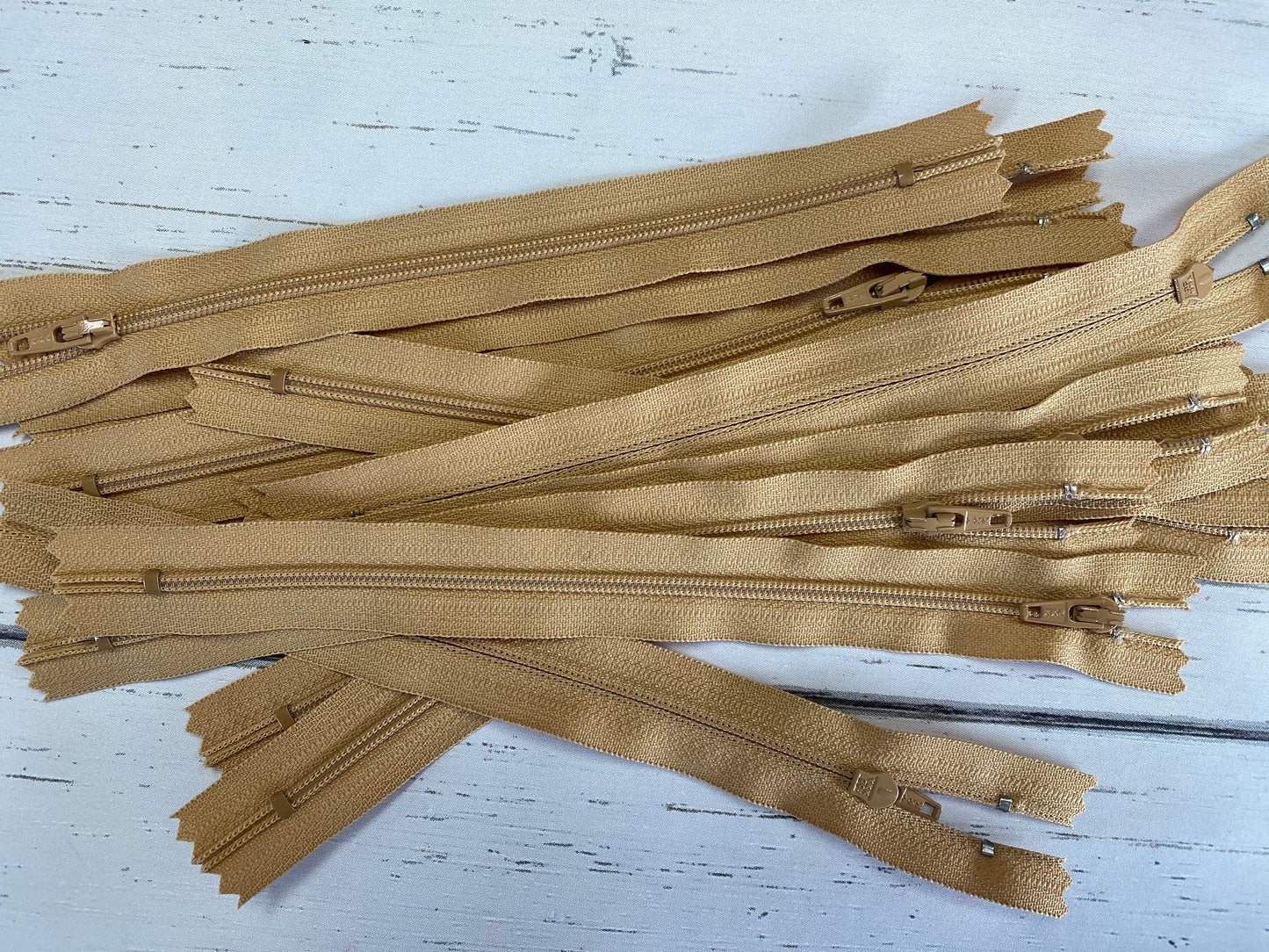 9" Tan nylon coil non-separating, closed-end zipper