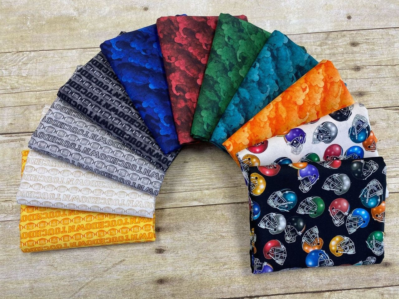 Football Novelteenies by Dan Morris Football Player Blender Orange 27987-O Cotton Woven Fabric