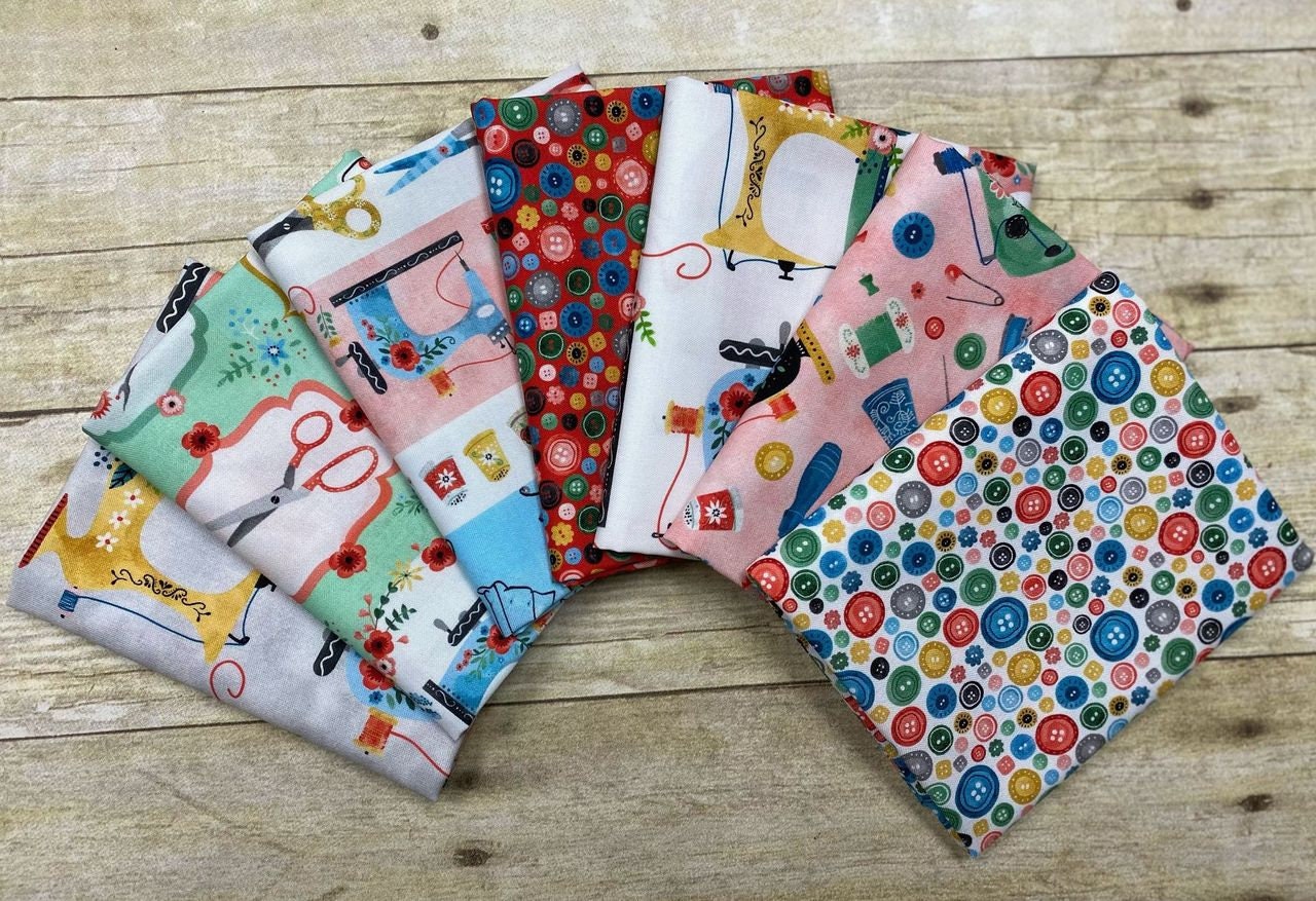 A Stitch in Time Buttons Water CX10222-WATE Cotton Woven Fabric