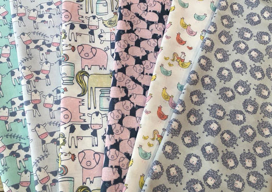 Deja Moo The Flock on White Cotton Woven Fabric