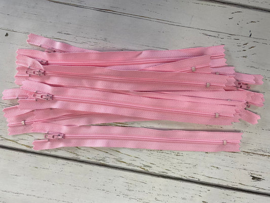 9" Pink nylon coil non-separating, closed-end zipper