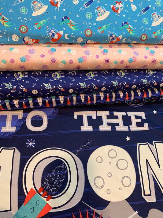 Out of This World Glow Aim For The Moon in Navy Glow in the Dark Cotton Woven Fabric