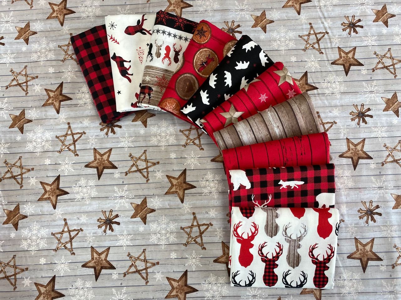 Warm Winter Wishes by Lucie Crovatto Wood Grain with Tossed Stars Red 5870-88 Cotton Woven Fabric